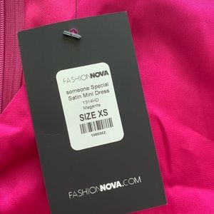 Fashion nova dress, bright pink, small cutout on stomach, brand new